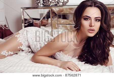 Gorgeous Woman With Dark Hair  In Elegant Lace Dress