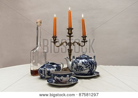 Old Candlestick And Tea Set