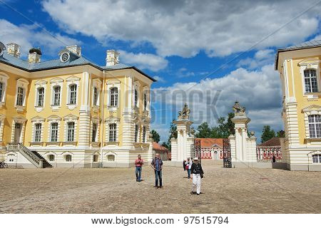 People explore Rundale palace in Pilsrundale, Latvia.