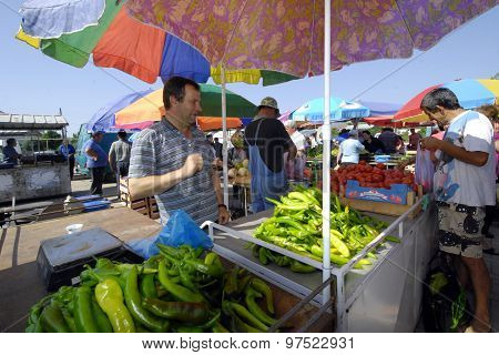 Picture of a Fruit and vegetable sellers at the market.August 2015. Resen,  Macedonia