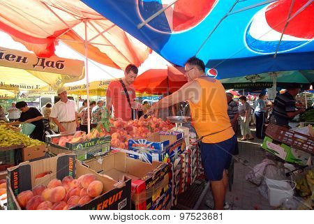 Picture of a Fruit and vegetable sellers at the market.August 1 2015. Resen,  Macedonia