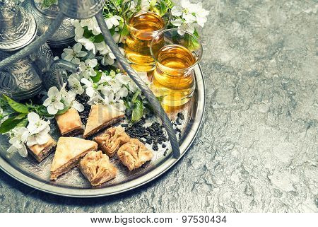 Tea Glasses And Pot, Traditional Cookies Baklava. Islamic Holidays