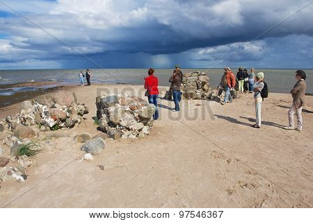 People enjoy the sea view at the Kolka cape in Kolka, Latvia.