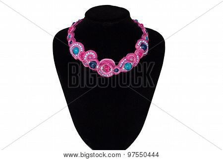 Pink Necklace On A Rack