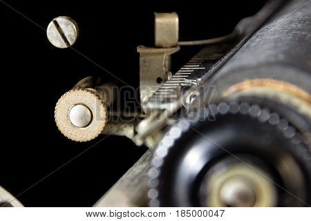 A Relic: An Outer Space Wannabe. Abstract of the gears and screws of a 1930's typewriter that seems to float in the blackness of space. Suitable for multiple business and industrial applications; business office, hotel and motel wall decoration.