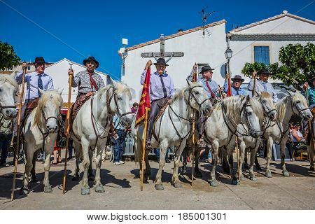 Sent-Mari-de-la-Mer, Provence, France - May 25, 2015. Square in the center of the city. World Festival of Gypsies. Guards on white horses lined up before the start of the parade