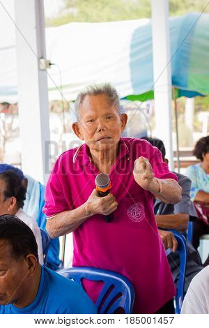 CHIANG RAI THAILAND - FEBRUARY 20 : unidentified man suffering from leprosy with pink shirt speak out at Christian camp on February 20 2016 in Chiang rai Thailand.