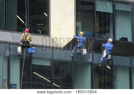 Moscow, Russia - May, 5, 2017: steeplejacks work in a center of Moscow