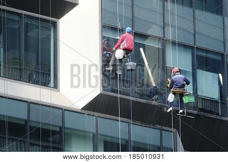 Moscow, Russia - May, 5, 2017: steeplejacks work in a center of Moscow