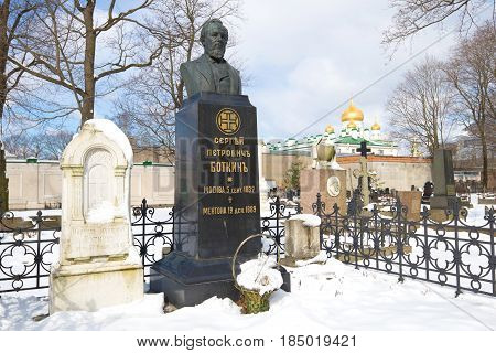 ST PETERSBURG, RUSSIA - APRIL 15, 2017: Monument on the grave of the famous Russian physician Sergei Petrovich Botkin on the Novodevichy Cemetery a cloudy March day