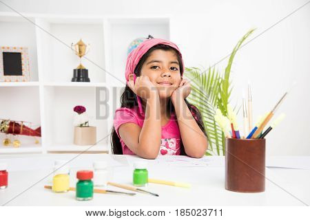 indian girl drawing, indian girl painting,asian girl colouring or drawing with sketch pen, indian girl and art and craft