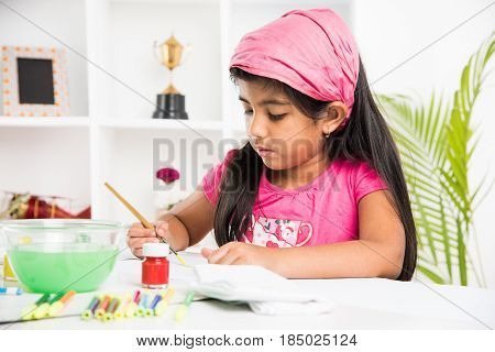 indian girl drawing, indian girl painting,asian girl colouring or drawing with sketch pen, indian girl and art and craft