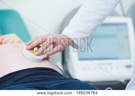 Pregnancy care. cardiotocography fetal heartbeat examination