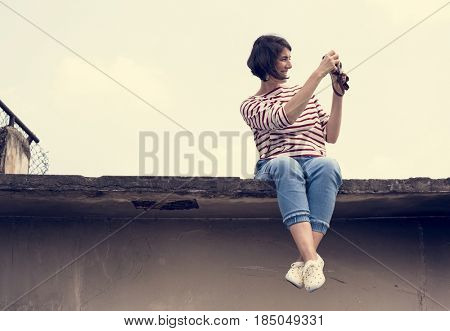 Woman traveler photographer holiday lifestyle trip