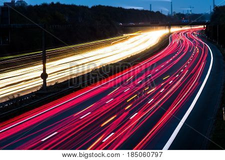 Highway at night with blurred car lights in a long exposure shot