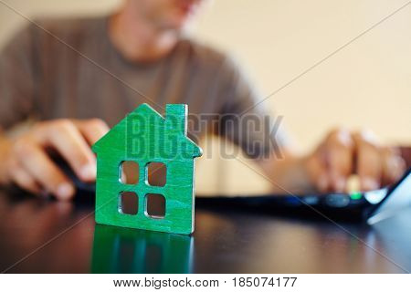 wooden house on the office table