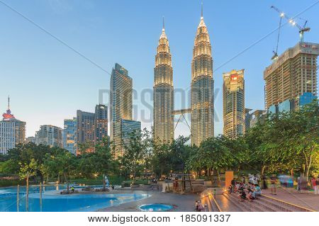 KUALA LUMPUR, MALAYSIA - AUGUST 13: Petronas Twin Towers at night on August 13, 2016 in Kuala Lumpur. Petronas Twin Towers were the tallest buildings (452 m) in the world from 1998 to 2004.