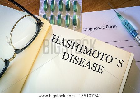 Book with diagnosis Hashimoto disease. Medical concept