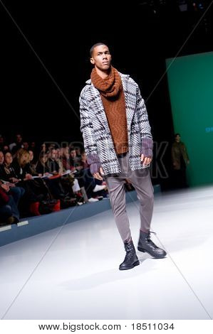 VALENCIA, SPAIN - FEBRUARY 2:  A model on the catwalk wearing a Georgina Vendrell design for the Valencia Fashion Week on February 2, 2010 in Valencia, Spain.