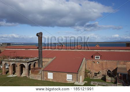 PUERTO NATALES, CHILE - APRIL 10, 2017: Historic buildings of a former meat refrigeration plant that have been renovated and converted into a luxury hotel.