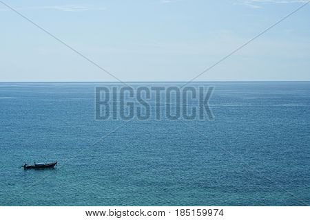 Over the sea; boat in summer ocean horizon