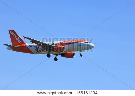 Amsterdam the Netherlands - May 5th 2016: G-EZDW easyJet Airbus A319-111 approaching Schiphol Polderbaan runway arriving from Edinburgh United Kingdom