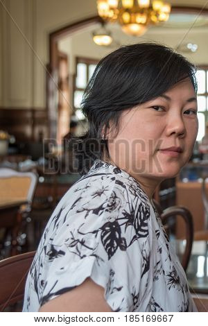 Asian Women Smile In Coffee Shop Vintage Style
