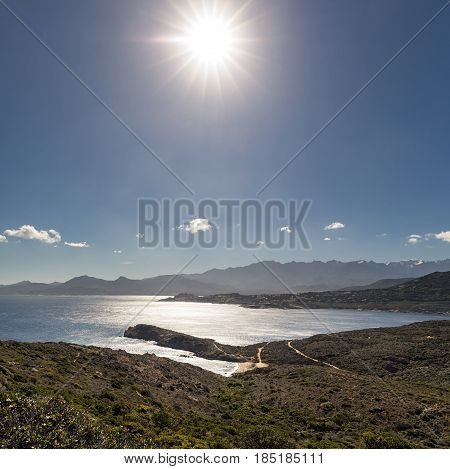 View Of Calvi Citadel And Mountains From Revellata In Corsica