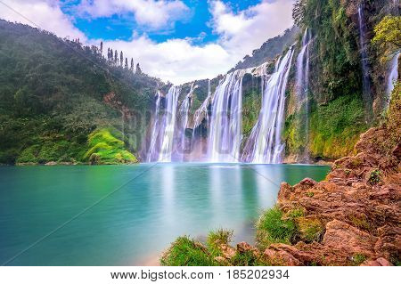Jiulong Waterfall In Luoping, China.