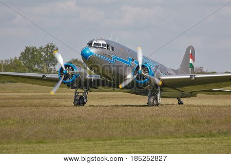 BUDAORS, HUNGARY - APRIL 27: Li-2 aircraft starting engines on 27th April, 2014. This aircraft is 65 years old.
