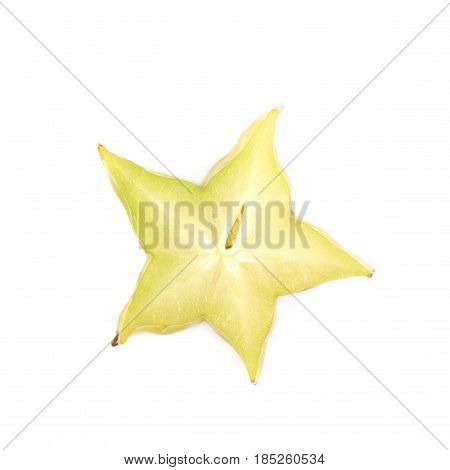 Single cross-section slice of carambola starfruit fruit isolated over the white background