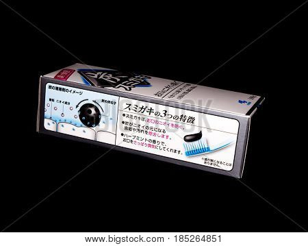 GOMEL, BELARUS - MARCH 5, 2017:Japanese toothpaste Kobayashi with charcoal.Kobayashi Pharmaceutical Co., Ltd. manufactures and sells OTC pharmaceuticals, oral hygiene products.