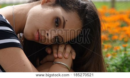 A Serious and Unemotional Hispanic Teen Girl