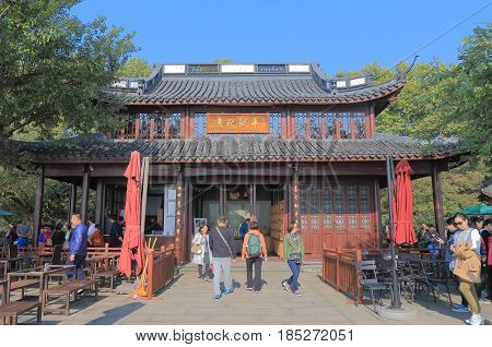 HANGZHOU CHINA - NOVEMBER 5, 2016: Unidentified people visit traditional tea house in West lake.