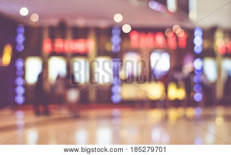 Blurred Background,people At Ticket Booth At Theatre With Bokeh Light