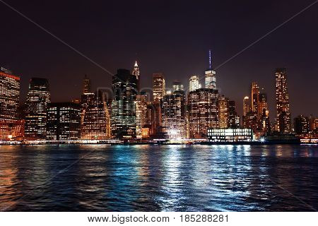 New York City Manhattan Downtown Skyline On Night Skyscrapers Illuminated Over Hudson River Panorama