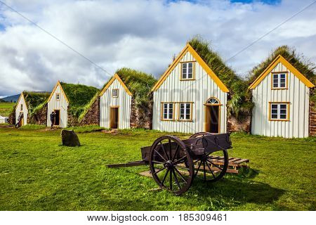 Ethnographic Museum-estate Glaumbaer, Iceland. The picturesque village of old houses covered with turf and grass. The concept of the cultural and historical tourism
