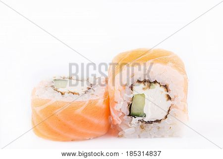 Japanese Cuisine, Sushi Set: Salmon Roll With Cucumber And Cheese On A White Background.