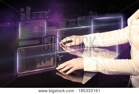 Male hands touching interactive table with purple cloudspace graphic on it 