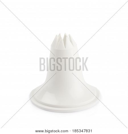 Decorational cream piping bag's plastic tip isolated over the white background