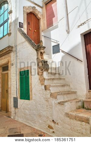 Characteristic alleyway of Locorotondo. Puglia. Southern Italy.