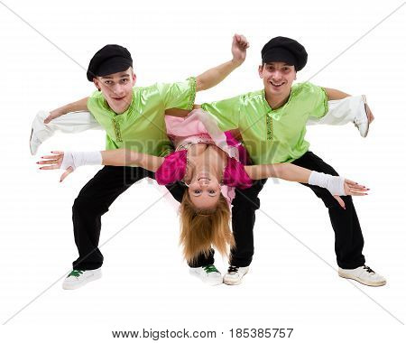 two men and one woman wearing a folk russian costume posing against isolated white background