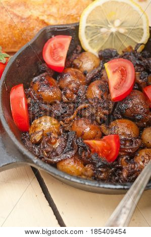 Baby Cuttle Fish Roasted On Iron Skillet
