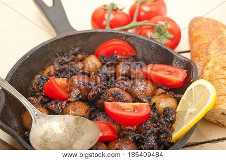 Baby Cuttle Fish Roasted On Iron Skillet