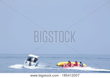 Sattahip Thailand,April 14,2017 : activity banana boat in the Nang Ram beach of Sattahip Chonburi Thailand.
