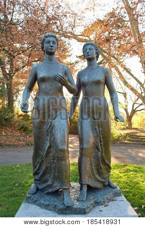 GENEVA, SWITZERLAND - CIRCA NOVEMBER, 2015: statue of two women in Geneva.