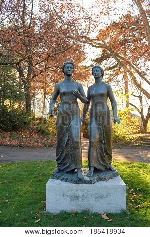 GENEVA, SWITZERLAND - CIRCA NOVEMBER, 2015: statue of two women in Geneva.