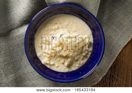Brazilian Dessert Canjica Our Mungunza Of White Corn In Blue Bowl
