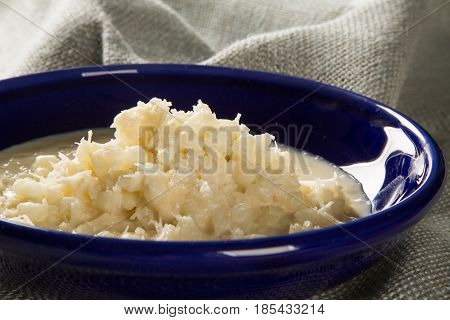 Brazilian Dessert Canjica Our Mungunza Of White Corn In Blue Bowl