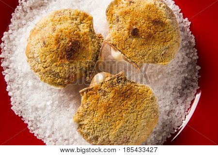 Siri food portion in red plate. Brazilian food.
